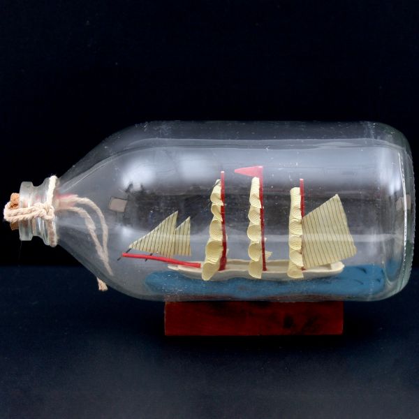 Glass Bottle in Ship With Wooden Base